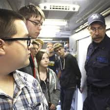 Robotics students meet bomb squad, learn about robot design