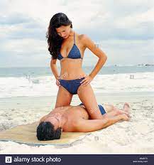 It is distinct from perceptions such as physical attractiveness, and involves views of what is and what is not considered beautiful or attractive. Beach Woman Stock Photos