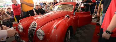 If you haven't been to our showroom in downtown palm springs, here is a quick glimpse of a couple of cars and our beautiful mountains. Classic Car Auctions