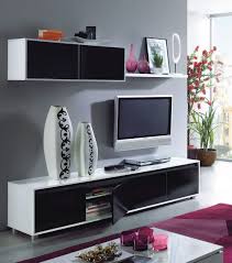 Fans, however, tend to exaggerate these hints and combine it with the ditz. Home Est Lena Black White Gloss Living Room Tv Stand Wall Cabinet Set