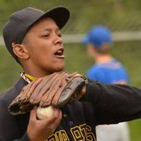 Jake Gilbert, a sophomore, throws a pitch as the U.S.