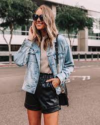 Fashion Jackson Wearing Levis Oversized Denim Jacket Faux Leather Shorts Fall Outfit Leather Shorts Outfit Fashion Jackson Leather Shorts