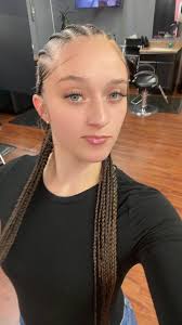 Confident White Girl with Braids Slaying Natural Hair Styles in Detroit