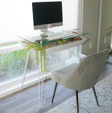 You can cover a planter box or pot with newly planted seeds using newspaper to keep in moisture, then remove the cover after plants are visible so you do not block the light. A Table That Lets You Build An Indoor Garden Even With Limited Space The Bitbag