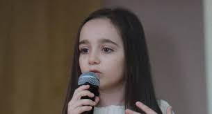 Little Marinka honors her hero father with song