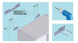 Use a sponge to rub the cleaner onto the cabinets. Wall Unit Fitting Adjustments Diy Kitchens Advice