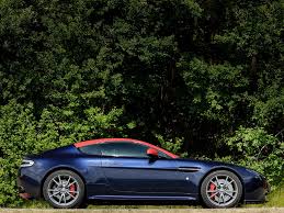 Image result for Midnight Blue 2010 Aston Martin