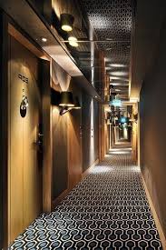 Make Low Spaces Taller With Mirror On The Ceiling Hotel Interior Design Hotel Interiors Hotel Corridor