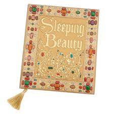 Sleeping beauty disney fairy tale book prop replica from the movie sleeping beauty. the materials of its construction include gold paint, acrylic paints, liquid leading, gemstones, and journal. Disney Store Sleeping Beauty A4 Replica Journal Shopdisney Uk