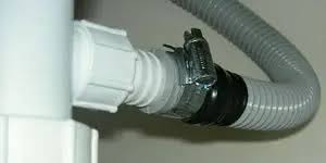 Move the drain opening to within five feet of either the washing machine or the sink, if they are farther apart than 10 feet. Installing A Washing Machine Drain Hose Whitegoodshelp