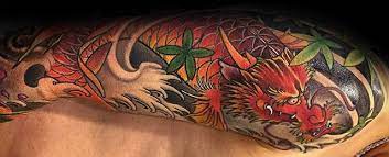 Red koi fish with a lotus. Top 47 Koi Dragon Tattoo Ideas 2021 Inspiration Guide