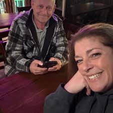 How to find a couple in Ingham County, Michigan, who were involved in a  real estate transaction and the wife was starting a company to help seniors?