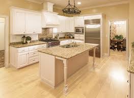 Pickled kitchen cabinet refinishing can be an inexpensive way to update your cabinets with a classic look. Ideal Interiors