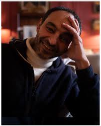 2022 — Double portrait of artist Rami Farah and me. Rami decided that we  looked alike and that taking a picture of me felt like taking a picture of  himself. I liked