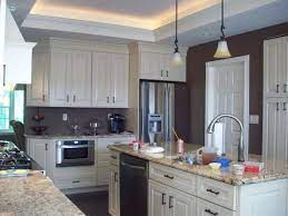 Lighting is commonly featured in this design, and these ceilings are often found in dining rooms for example, a small plain kitchen can be made more interesting by creating an inverted tray ceiling pot rack as a focal point. Tray Ceiling Kitchen Renovation Kitchen Remodel Small Kitchen Renovation Kitchen