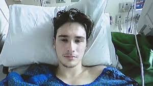 Man charged in deadly 112 mph Renton crash pleads not guilty from hospital  bed