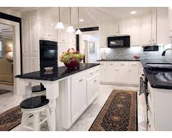 A stylish black and white kitchen by sara ray interior design combines open shelving with black shaker base cabinets. Off White Cabinets With Granite Countertops Ideas Black Granite Kitchen Black Countertops Black Granite Countertops