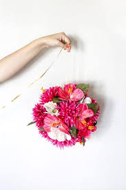 They're gorgeous for a backyard wedding, adding a fairytale vibe to your space. How To Make Your Own Diy Hanging Flower Ball Flower Ball Diy Hanging Hanging Flowers