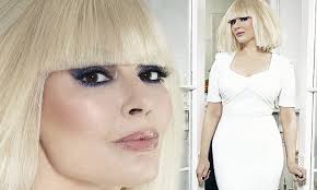 Nigella Lwson is famed for raven locks... but what's this striking new  look?