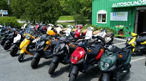 Great Scooter Selection Outside Of Ez Bikes And Scooters In Exeter Http Www Ezbikesandscooters Com Electric Bikes For Sale Bike Motor Scooters