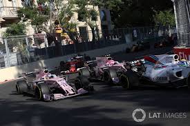 Dnf For Sergio Perez Sahara Force India Vjm10 And Esteban Ocon Sahara Force India Vjm10 At The Restart Force India Sergio Perez Formula 1