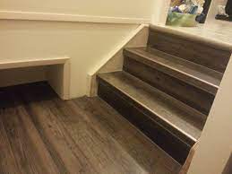 Vpi vinyl stair treads allow the adhesive on the treads to thoroughly dry before completing initial maintenance. Drop Done Luxury Vinyl Plank In Eastern Township With Metal Insert Stair Laminate Stairs Vinyl Plank Flooring Vinyl Plank Flooring On Stairs