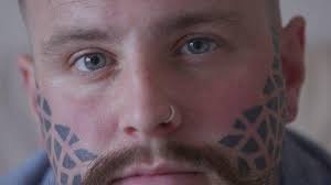 Chris Dalzell tattoos: The man whose face divides opinion