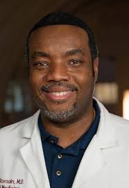 The daycare provider's child dresses up as a doctor with kind and gentle  staff