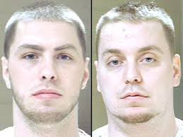 Two brothers charged in beating at bar