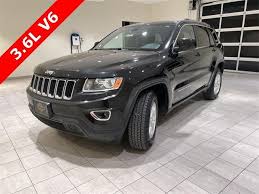 Image result for Brilliant Black 2014 Grand Cherokee