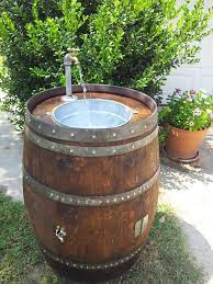 Upcycle old wine barrels yourself, or shop at vivaterra for beautiful pieces for your outdoor living space. An Outdoor Barrel Sink Perfect For An Outdoor Kitchen Garden Area Outdoor Shop Lake H Water Features In The Garden Rustic Style Furniture Outdoor Fire Pit