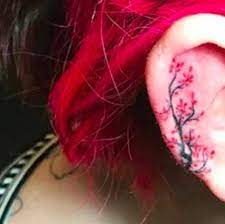 9 Helix Tattoos That Will Have You Running To Your Favorite Ink Shop Helix Tattoo Helix Tattoo Ear Tattoo Ear