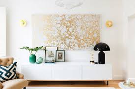 Jan 30, 2018 · in the living room of meredith melling and zach iscol's retreat on martha's vineyard, which was designed by ariel ashe and reinaldo leandro of ashe + leandro, the sofa by restoration hardware is covered in a perennials linen, the hans wegner chairs are upholstered in a brochier fabric, and the walnut cocktail table and stool are custom; 10 Sideboard Styling Ideas To Suit Your Home Houzz Au
