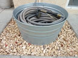 10 Creative Garden Hose Storage Ideas Hose Storage Garden Hose Storage Garden Hose Holder