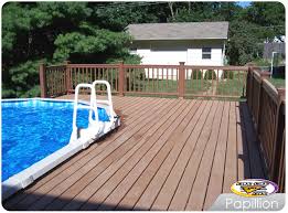 A deck makes an above ground pool easier to climb into, gives you a place to lounge by the water, and with the right design, vastly improves its appearance. Images Tagged Above Ground Pool Deck Decks Decks And More Decks Custom Deck Builder Omaha