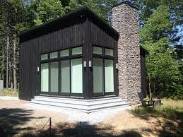 Rustic 24ft arcadia tiny house Shou Sugi Ban Siding On Tiny House Tiny House Exterior Houses In Austin Small Cottages