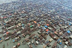 While Lagos Nigeria Africa S Largest City Has Modern Towers There Are Parts Of The City That Evoke The Yoruba Past This Floati City Floating House Africa