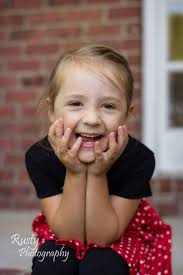 ISO a photographer to take kindergarten graduation pictures.