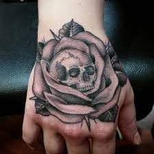 Check spelling or type a new query. Tattoos Skull Hand Holding Rose Novocom Top