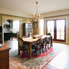 30 Rugs That Showcase Their Power Under The Dining Table Rug Under Dining Table Area Rug Dining Room Large Kitchen Rugs