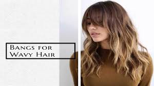 The added side layered bangs are an excellent choice to give the style a youthful and more modern touch. Best Bangs For Wavy Hair Bangs For Difference Face Shapes Hair Trends