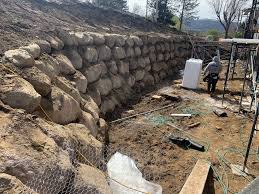 Is highly knowledgeable and ready to help. Retaining Wall Installer In West Valley Ra Johnson Excavating Rock