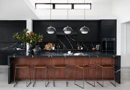 Some kitchen islands are stationary for a secure workspace, while some islands come with casters so they can be moved easily when necessary. Black Kitchen Islands With Seating Ideas And Inspiration Hunker