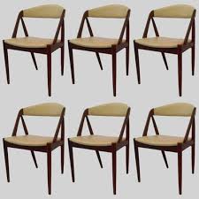 We did not find results for: Model 31 Teak Dining Chairs By Kai Kristiansen For Schou Andersen 1950s Set Of 6 For Sale At Pamono