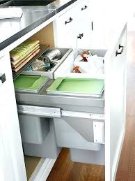 Maybe you would like to learn more about one of these? Under Counter Trash Can Under Counter Garbage Can A False Front Door Drawer Conceals Four Compartments That Easily Slide Out Under Counter Garbage Can Kitchen Counter Trash Chute Decorology