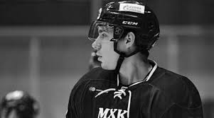 The rubber disk hit faizutdinov on the head with force, despite his helmet, as he stood on the blue line. F Ajodnanwwbbm