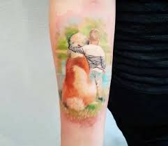 A parent using a tattoo to honor the addition of a child to the family is not alone. Child And Dog Tattoo By Adam Kremer Post 23127