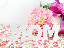 Also referred to as mums, the chrysanthemum is the flower for people born in november. Gifts And Beautiful Bouquet Of Flowers For Mom For Mother Day Or Birthday Stock Photo Picture And Royalty Free Image Image 55254471