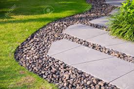 Green Lawn Beautiful Stepping Stone Pathway With Green Lawn Walkway In The Garden Garden Landscape Design Stock Photo Picture And Royalty Free Image Image 120736660