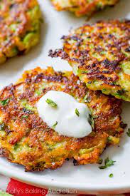 Scoop about 2 tablespoons of batter into the pan and use a spatula to flatten. Zucchini Fritters With Garlic Herb Yogurt Sauce Sally S Baking Addiction